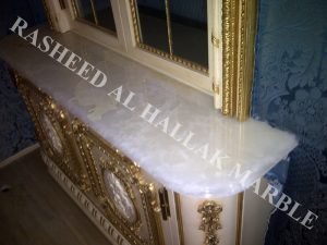 WHITE ONYX PROFILED COUNTER TOPS FOR CHOCOLATE SHOP AT DUBAI MALL