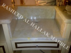 WHITE ONYX PROFILED COUNTER TOPS FOR CHOCOLATE SHOP AT DUBAI MALL