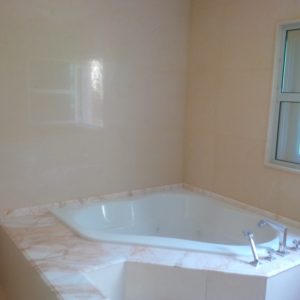 Master Bathroom Jacuzzi- Platinum Cream/Golden Spider Marble Works