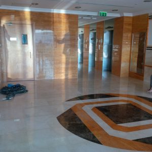 Wall Cladding & Flooring IN ORANGE TRAVERTINE AND ROYALCREAMA  MARBLE