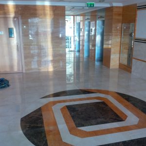 Wall Cladding & Flooring IN ORANGE TRAVERTINE AND ROYALCREAMA  MARBLE